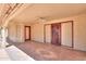 Cozy covered patio with tile flooring and ceiling fan, ideal for outdoor relaxation at 2119 N Lake Shore Dr, Casa Grande, AZ 85122