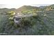 Custom home with private pool featuring hillside desert landscape, mountain views, and desert foliage at 10537 N Crestview Dr, Fountain Hills, AZ 85268