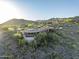 Custom home with private pool featuring hillside desert landscape, mountain views, and desert foliage at 10537 N Crestview Dr, Fountain Hills, AZ 85268