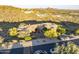 Elegant desert home with mature landscaping and picturesque mountain views in the distance at 10537 N Crestview Dr, Fountain Hills, AZ 85268