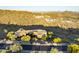 Stunning aerial view showcases a luxurious home nestled in a desert landscape with mountain views at 10537 N Crestview Dr, Fountain Hills, AZ 85268