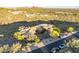 Desert home featuring lush landscaping and stunning mountain views in the background at 10537 N Crestview Dr, Fountain Hills, AZ 85268
