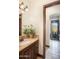 Bathroom vanity with beautiful counters and view of the mountain through the doorway at 10537 N Crestview Dr, Fountain Hills, AZ 85268