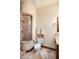 This bathroom features a travertine tile shower with glass door, and tile floor at 10537 N Crestview Dr, Fountain Hills, AZ 85268
