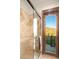 Tile-walled shower and doorway to the patio at 10537 N Crestview Dr, Fountain Hills, AZ 85268