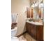 A well-lit bathroom features a vanity, mirror, and a towel rack at 10537 N Crestview Dr, Fountain Hills, AZ 85268