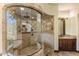 Bathroom featuring a spacious tiled shower with glass door and a vanity with sink at 10537 N Crestview Dr, Fountain Hills, AZ 85268