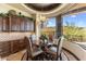 Inviting breakfast nook with a large picture window and a decorative chandelier at 10537 N Crestview Dr, Fountain Hills, AZ 85268