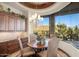 This charming breakfast nook features custom cabinetry and a picturesque view of the Arizona desert at 10537 N Crestview Dr, Fountain Hills, AZ 85268