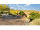 Attractive home exterior with a driveway paved in pavers and mature landscaping at 10537 N Crestview Dr, Fountain Hills, AZ 85268