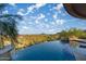 Infinity pool with desert views, creating a serene and luxurious outdoor experience at 10537 N Crestview Dr, Fountain Hills, AZ 85268