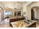 Well-appointed kitchen with granite countertops, a center island, and a wine refrigerator at 10537 N Crestview Dr, Fountain Hills, AZ 85268