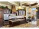 Luxury kitchen with custom cabinetry, granite countertops and view of neighborhood landscape at 10537 N Crestview Dr, Fountain Hills, AZ 85268