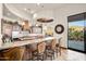 Gourmet kitchen featuring custom cabinets, granite countertops, and breakfast bar with seating at 10537 N Crestview Dr, Fountain Hills, AZ 85268