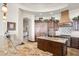 Well-equipped kitchen offers stainless appliances, custom cabinets, and granite counters at 10537 N Crestview Dr, Fountain Hills, AZ 85268