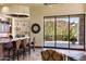 Open kitchen with granite countertop bar seating and access to an outdoor patio at 10537 N Crestview Dr, Fountain Hills, AZ 85268