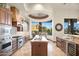 Spacious kitchen offers custom cabinets, stainless appliances, and adjacent dining area at 10537 N Crestview Dr, Fountain Hills, AZ 85268