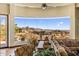 Elegant living room with oversized windows showcasing mountain views and desert landscape at 10537 N Crestview Dr, Fountain Hills, AZ 85268