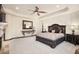 The main bedroom features a ceiling fan, ample space, and views of the home's elegant interior design at 10537 N Crestview Dr, Fountain Hills, AZ 85268