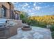 Built-in grill and fire pit on the patio create perfect space for outdoor entertaining at 10537 N Crestview Dr, Fountain Hills, AZ 85268