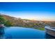 Infinity pool with beautiful desert and mountain views at 10537 N Crestview Dr, Fountain Hills, AZ 85268