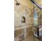 A tiled shower features a mosaic accent, rain shower head, and a glass partition at 10537 N Crestview Dr, Fountain Hills, AZ 85268