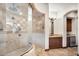 This walk-in shower boasts multiple shower heads and stylish tiling, offering a spa-like experience at 10537 N Crestview Dr, Fountain Hills, AZ 85268