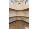 Walk-in closet with built-in shelves, carpet, and wood baseboards at 10537 N Crestview Dr, Fountain Hills, AZ 85268