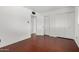 This bedroom features wood-look floors, and a closet for plenty of storage at 4729 W Orangewood Ave, Glendale, AZ 85301
