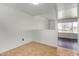 This room features neutral paint, tile flooring, and a large window with neighborhood views at 4729 W Orangewood Ave, Glendale, AZ 85301