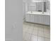 Bathroom with double sink vanity and tiled floors at 16186 W Silver Falls Dr, Surprise, AZ 85374
