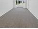 Bright bedroom with carpet flooring and lots of natural light at 16186 W Silver Falls Dr, Surprise, AZ 85374