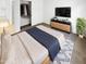 Cozy bedroom with modern furnishings, closet access, and natural light at 16186 W Silver Falls Dr, Surprise, AZ 85374