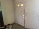 Interior shot of a white door with a switchplate to the right of the door at 1535 E Christy Dr, Phoenix, AZ 85020