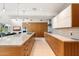 Bright kitchen with modern cabinetry, stainless steel appliances and large island at 8517 N 48Th Pl, Paradise Valley, AZ 85253