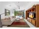 Relaxing living room with sleek furnishings and views of the private pool area at 8517 N 48Th Pl, Paradise Valley, AZ 85253