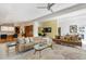 Open-concept living area flows to kitchen and dining, featuring neutral tones, and inviting seating at 8517 N 48Th Pl, Paradise Valley, AZ 85253