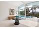 Bright living room with seamless indoor-outdoor flow to a private pool and desert landscape at 8517 N 48Th Pl, Paradise Valley, AZ 85253