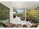 Covered patio area featuring comfortable seating and views of the lush desert landscaping at 8517 N 48Th Pl, Paradise Valley, AZ 85253