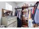 Neatly organized closet with shelving, drawers and hanging space at 31221 N 161St Pl, Scottsdale, AZ 85262