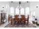 Formal dining room with large windows and wooden table at 31221 N 161St Pl, Scottsdale, AZ 85262