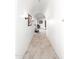 Long hallway with tile flooring, leading to living spaces at 31221 N 161St Pl, Scottsdale, AZ 85262