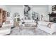 Living room featuring a spiral staircase and comfortable seating at 31221 N 161St Pl, Scottsdale, AZ 85262