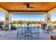 Covered patio with mountain views and seating area at 31221 N 161St Pl, Scottsdale, AZ 85262