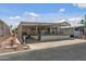 Charming home exterior with covered parking and outdoor patio area at 17200 W Bell Rd # 624, Surprise, AZ 85374