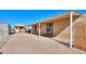 Mobile home with covered patio and additional shed at 192 S Ralston Rd, Maricopa, AZ 85139