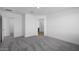 Comfortable bedroom with plush carpeting, neutral walls, and ensuite bathroom at 24668 W Alta Vista Rd, Buckeye, AZ 85326
