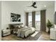 Bright bedroom features vaulted ceiling, modern decor, and plush rug creating a serene and inviting space at 8055 E Thomas Rd # E117, Scottsdale, AZ 85251