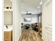 A view of the living room from the hallway, showing modern furnishings and fixtures at 8055 E Thomas Rd # E117, Scottsdale, AZ 85251