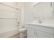 This bathroom features modern fixtures, a bathtub, and a tiled shower at 4735 W Stargazer Pl, Laveen, AZ 85339